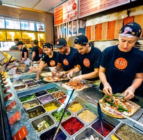 Blaze Fast-Fire'd Pizza will open Thursday at 1930 Douglas Parkway in Erie. The location on Friday will offer free build-your-own pizzas in exchange for a social media like/follow. [CONTRIBUTED PHOTO]