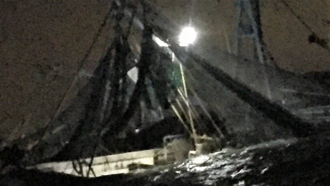 This Coast Guard image shows the nighttime rescue of the north Mayport Jetties.(Coast Guard)
