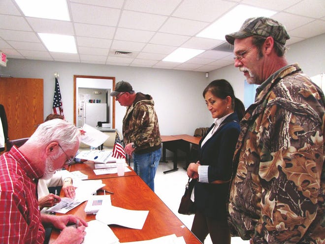 Voters line up for ballots in Cincinnati Township Precinct 2, one of the few precincts in Tazewell County to have a better turnout of the Consolidated Election Tuesday. Approximately 180 people had voted by 5:30 p.m. SHARON WOODS HARRIS / PEKIN DAILY TIMES