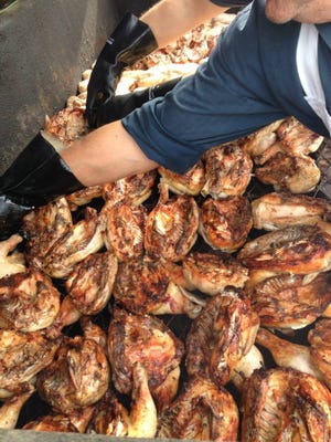 Hundreds of pieces of chicken will be grilled up Friday for a Hospice benefit. SUBMITTED PHOTO