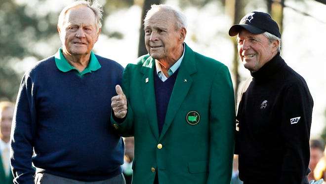 Jack Nicklaus, Arnold Palmer and Gary Player pose before the opening of the 2016 Masters tournament at the Augusta National Golf Club. With Palmer’s passing last fall, Nicklaus and Player will hit the first ceremonial shots of the week on Thursday. (AP Photo/Matt Slocum, File)