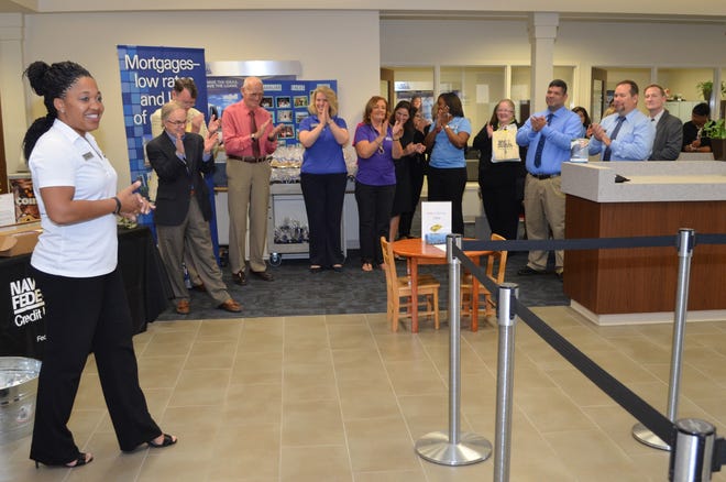 NFCU Mayport Branch Manager, Denise Campbell, thanks friends and workers of Navy Federal Credit Union for joining the bank in celebrating its 40th anniversary on board Naval Station Mayport on March 30.