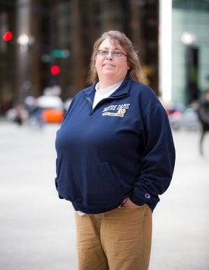 This 2015 photo provided by Lambda Legal shows Kimberly Hively at the federal courthouse in Chicago. A federal appeals court ruled for the first time Tuesday, that the 1964 Civil Rights Act protects LGBT employees from workplace discrimination, setting up a likely battle before the Supreme Court as gay rights advocates push to broaden the scope of the 53-year-old law.