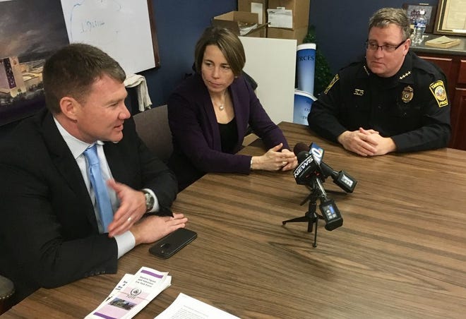 Attorney General Maura Healey sat down Wednesday to discuss the opioid problem with officials including Taunton Mayor Thomas Hoye Jr., left, and Police Chief Edward Walsh.