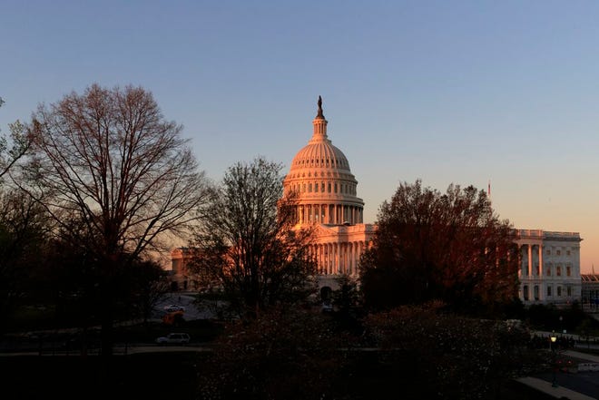 The Capitol is seen at sunrise in Washington, Wednesday. The Trump administration and Republican lawmakers plan to continue their uphill effort to exhume the House GOP's health care bill, but remain adrift and divided over how to reshape it to attract enough votes to muscle it through the chamber. (AP Photo/J. Scott Applewhite)