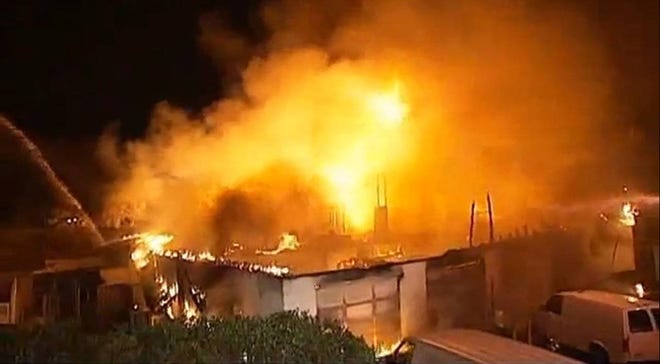 A 2007 fire rages at the Jacksonville Humane Society on Beach Boulevard. The fire destroyed much of the facility and killed 86 animals. (Provided by Jacksonville Fire and Rescue Department)