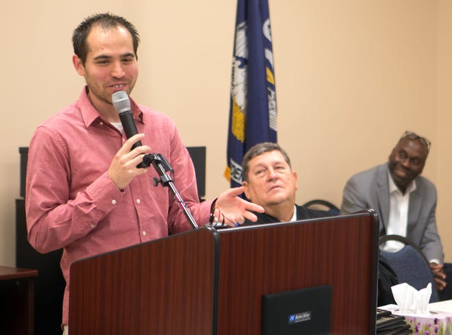 Aaron Daigle of Life Church of Houma gives motivation to this year's Terrebonne Parish Drug and DWI Treatment Court graduates at the program's facility in Houma.[Chris Heller/Staff - houmatoday/dailycomet]