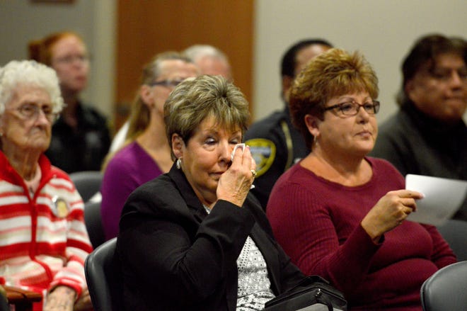 Community members attend a remembrance ceremony held at the Lake County Courthouse on Friday in Tavares. The State Attorney's Office honored victims of violent crimes. [AMBER RICCINTO / DAILY COMMERCIAL]