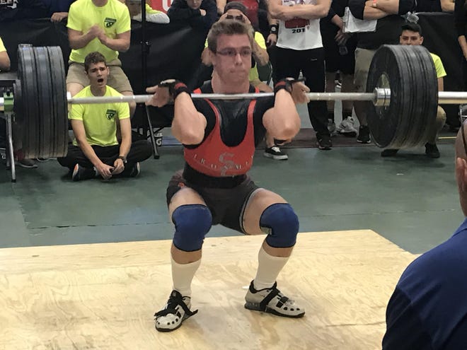 Spruce Creek senior Derek Beauchamp attempts a 330-pound clean and jerk to win an individual state championship Friday in DeLand. [News-Journal/Chris Boyle]