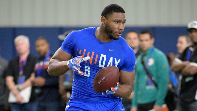 Linebacker Daniel McMillian (13) runs through a drill during Florida’s NFL Pro Day on March 28 in Gainesville, Fla. (Associated Press)