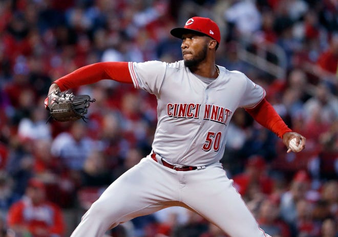 Cincinnati Reds starting pitcher Amir Garrett throws during the first inning of the team's baseball game against the St. Louis Cardinals Friday, April 7, 2017, in St. Louis. (AP Photo/Jeff Roberson)