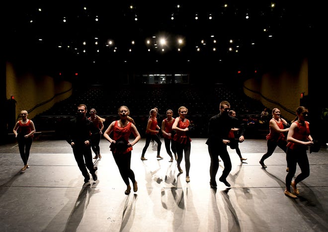 --Monroe News photo by TOM HAWLEY The Monroe County Community College Inside Out Dance Ensemble dancers rehearse their closing number Steamheat for their upcoming production Stage and Screen this weekend at the La-Z-Boy Center, Meyer Theatre at MCCC.