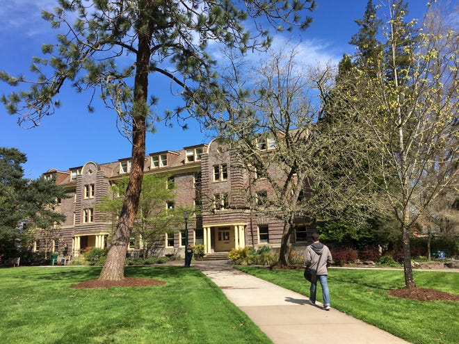 The College of Arts and Sciences at the University of Oregon announced Thursday that it will be cutting 31 jobs. The college is based in Friendly Hall, as seen Thursday, but has units around campus. (Dylan Darling/The Register-Guard)