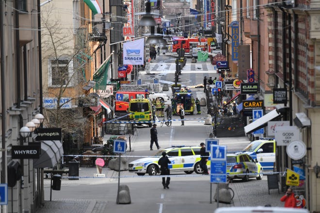 A view of the scene after a truck crashed into a department store injuring several people in central Stockholm, Sweden, Friday April 7, 2017. Swedish Prime Minister Stefan Lofven says everything indicates a truck that has crashed into a major department store in downtown Stockholm is "a terror attack." THE ASSOCIATED PRESS