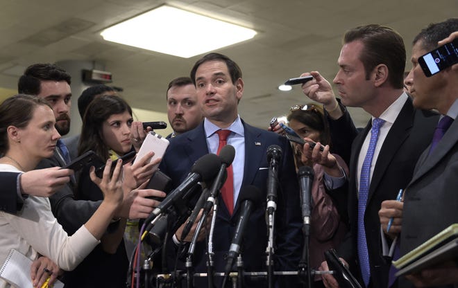 Sen. Marco Rubio, R-Fla., speaks to reporters following a briefing on Syria on Capitol Hill in Washington, Friday, April 7, 2017. Amid measured support for the U.S. cruise missile attack on a Syrian air base, some vocal Republicans and Democrats are reprimanding the White House for launching the strike without first getting congressional approval. (AP Photo/Susan Walsh)