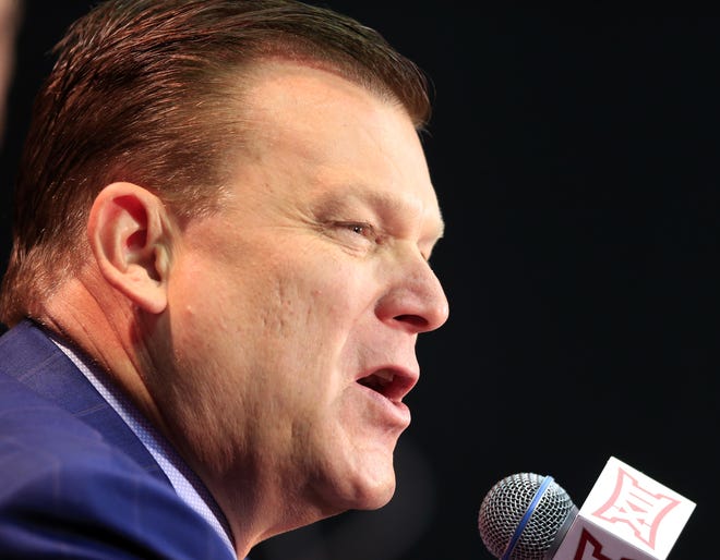 Oklahoma State coach Brad Underwood answers a reporters questions during Big 12 NCAA college basketball media day in Kansas City, Mo., Tuesday, Oct. 25, 2016. (AP Photo/Orlin Wagner)