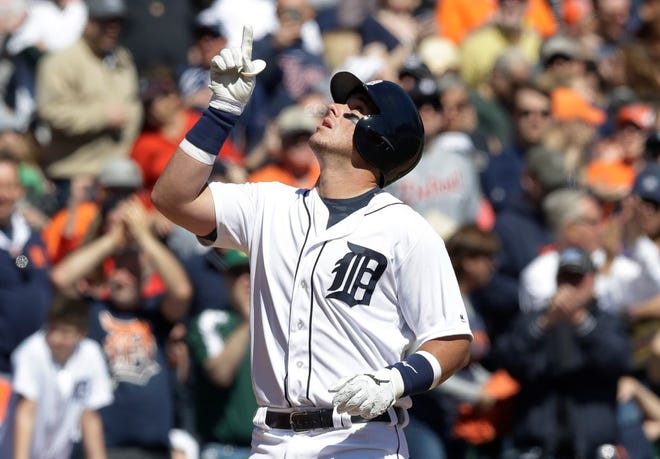 Detroit's James McCann points to the sky after hitting a solo home run in the fifth inning.