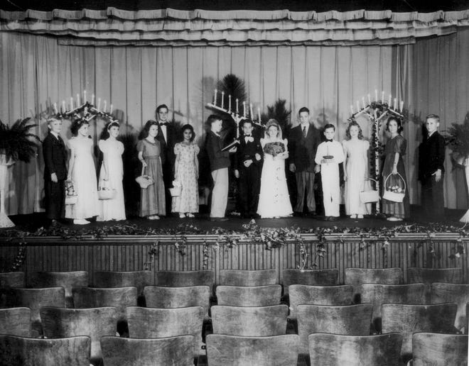 Rex Griffin as the groom and Ann Adams as the bride in the fourth grade play "The Wedding" at Massey Hill School in October 1944.