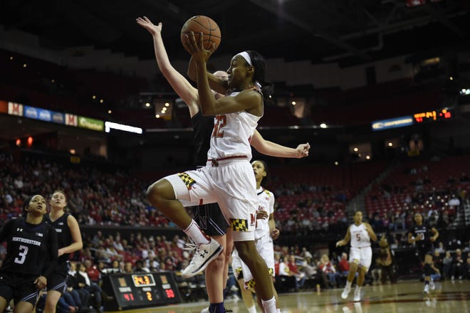 Maryland's Shatori Walker-Kimbrough drives to the basket against Northwestern in the first half of a Jan. 17, 2016 game in College Park, Md. The Hopewell native is expected to be taken in the first round of the upcoming WNBA Draft.