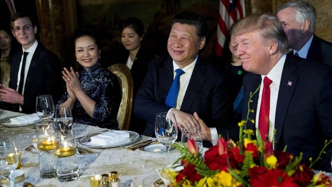 President Donald Trump and President Xi Jinping of China shake hands during a dinner at Trump’s Mar-a-Lago resort in Palm Beach, Fla., April, 6, 2017. (Doug Mills/The New York Times)