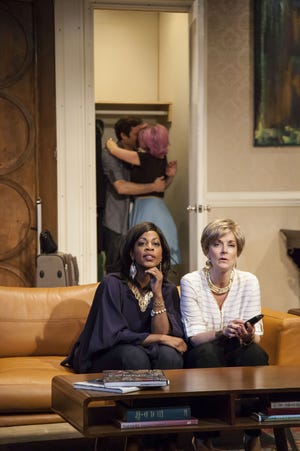 Tanesha Gary, left and Allison Daugherty try to have a conversation while Justin Adams and Ali Rose Dachis kiss in the closet in Victoria Stewart's "Rich Girl" at Florida Studio Theatre. Matthew Holler photo/FST