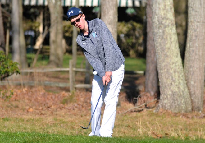 Shawnee's Evan McNally chips the ball to the green during the Burlington County Golf Open at Little Mill Country Club on Monday, April 10, 2017. McNally shot 83 and helped Shawnee win the team title with a 329 score.