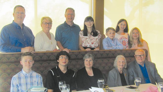 Eileen Palmer, seated, second from right, celebrated her 100th birthday with family and friends Friday at Hillcrest Country Club. She was born March 3, 1917.