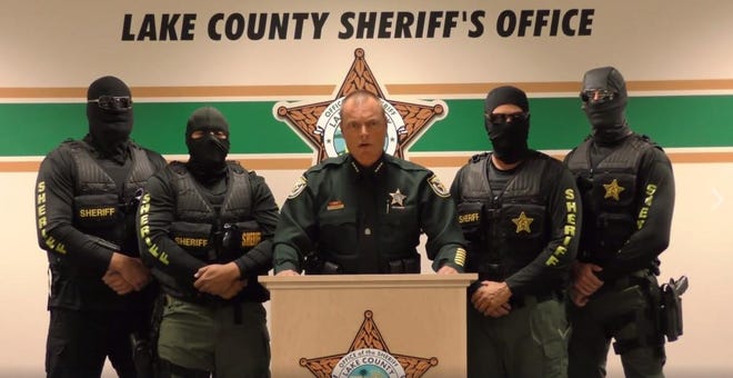 In this image from video, Lake County Sheriff Peyton Grinnell appears with undercover agents and warns heroin dealers that they are coming for them. [Provided by Lake County Sheriff's Office]