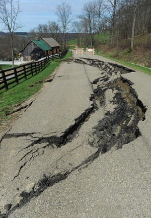 TIMES-REPORTER PAT BURK

A road collapse at 6612 Boy Scout Rd. NE has the road closed Wednesday afternoon.