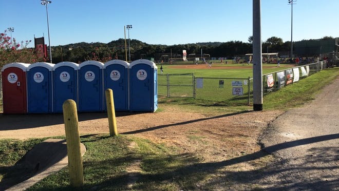 The Lake Travis Youth Association Field of Dreams on Texas 71 currently has an unpaved parking lot and non-permanent bathroom facilities. RACHEL RICE/LAKE TRAVIS VIEW