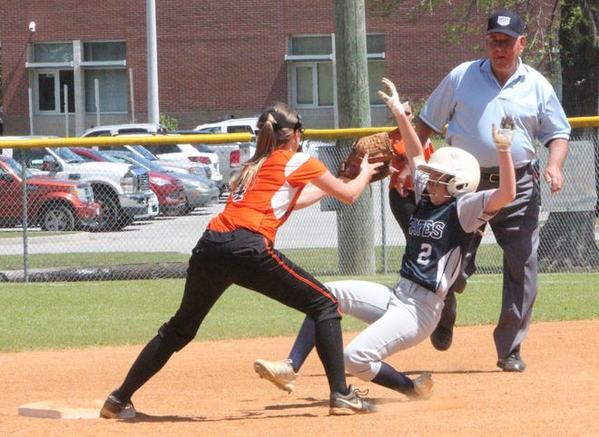 Swansboro's Montana Walton slides into second ahead of the tag by Southwest shortstop Madi Fry during the Pirates' 3-2 win Monday in the first round of the Piggly Wiggly Softball tournament at Richlands HS. [Rick Scoppe/The Daily News]