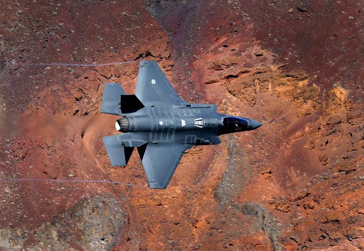 A Lockheed Martin F-35A Lighting II from the 323 Squadron, Royal Netherlands Air Force flies through the nicknamed Star Wars Canyon on the Jedi transition in Death Valley National Park, Calif. Military jets roaring over national parks have long drawn complaints from hikers and campers. But in California's Death Valley, the low-flying combat aircraft skillfully zipping between the craggy landscape has become a popular attraction in the 3.3 million acre park in the Mojave Desert, 260 miles east of Los Angeles.