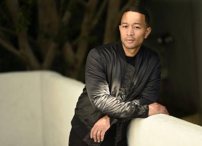 In this Nov. 21, 2016 file photo, singer-songwriter John Legend poses for a portrait at the Sunset Marquis Hotel in West Hollywood, Calif. [Photo by Chris Pizzello/Invision/AP]