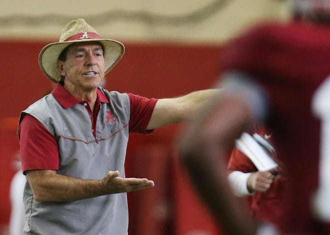Alabama coach Nick Saban gives feedback to the defensive backs as they run drills during Alabama football spring practice held at the indoor practice facility Wednesday April 5, 2017.  [Staff Photo/Erin Nelson]