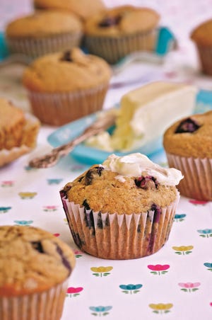 The recipe for Mel's Banana Muffins is featured in "Trisha's Table," a new cookbook by country music artist Trisha Yearwood. [Photo courtesy of Ben Fink/Clarkson Potter Publishers]