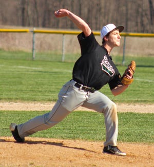 North Adams-Jerome's Shad Kittle hurls a pitch to home plate. [ANDREW KING PHOTO]