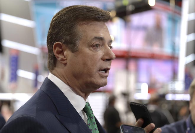 In this July 17, 2016, file photo, then-Donald Trump campaign chairman Paul Manafort talks to reporters on the floor of the Republican National Convention in Cleveland. A firm headed by Manafort received more than $1.2 million in payments that correspond to entries in a handwritten ledger tied to a pro-Russian political party in Ukraine, according to financial records obtained by The Associated Press. The payments between 2007 and 2009 are the first evidence that Manafort's consulting firm received funds listed in the so-called Black Ledger, which Ukrainian investigators have been investigating as evidence of off-the-books payments from the Ukrainian Party of Regions. THE ASSOCIATED PRESS
