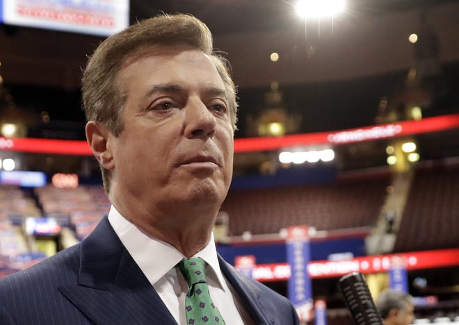 In this July 17, 2016, file photo, then-Donald Trump campaign chairman Paul Manafort talks to reporters on the floor of the Republican National Convention in Cleveland. Manafort will register with the Justice Department as a foreign agent for lobbying work he did on behalf of Ukraine, led at the time by a pro-Russian political party, his spokesman said Wednesday, April 12. THE ASSOCIATED PRESS