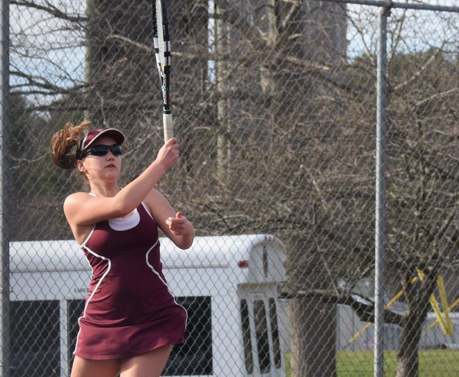 Portsmouth High School's Hanna Street returns a forehand in her No. 1 singles match against Oyster River on Thursday in Portsmouth. [Mike Zhe/seacoastonline.com]