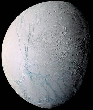 This June 28, 2009 image provided by NASA, taken by the international Cassini spacecraft, shows Enceladus, one of Saturn’s moons. NASA’s Cassini spacecraft has detected hydrogen molecules in the geysers shooting off the ice-encrusted ocean world, possibly the result of deep-sea chemical reactions between water and rock that could spark microbial life, according to findings announced Thursday, April 13, 2017 in the journal Science. (AP Photo/NASA)