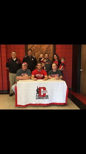 Submitted photo

Coshocton senior Jordan Carkin, a son of Brandi and Ben Giesey and Scott Carkin of Coshocton, signed a national letter of intent to continue his education and play football at Ohio Wesleyan University in Delaware. "Jordan is one of the most talented and yet unselfish players we have had at Coshocton," said Coshocton Athletic Director Tim Fortney. "His explosiveness off the edge was a distinct advantage for our defense on our final four playoff team this past season. We all hope that Jordan continues his success at Ohio Wesleyan University." Carkin earned numerous accolades in his last two varsity seasons at Coshocton, including second team Division V All-Ohioan, first team East District, first team East Central Ohio League and league defensive player of the year. He also holds the single season school record in sacks with 11.