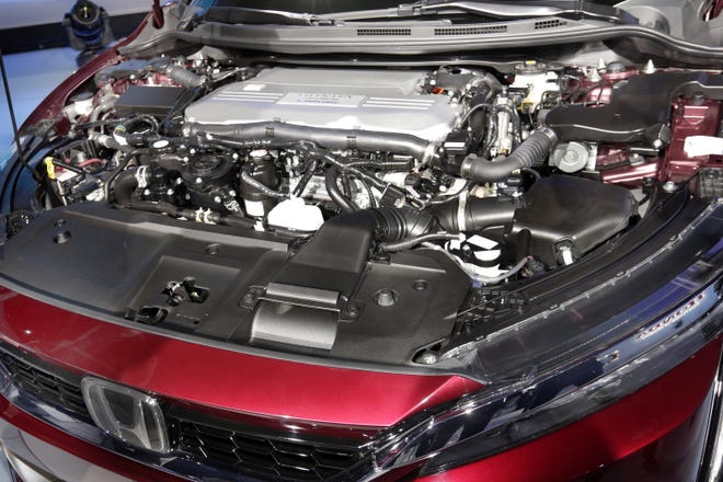 The fuel cell engine of the Honda Clarity is shown during a media preview at the New York International Auto Show, at the Jacob Javits Center in New York, Wednesday, April 12, 2017. (AP Photo/Richard Drew)