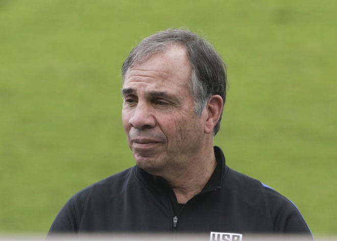 Bruce Arena, United States soccer head coach, stands on field before a training session in Panama City on March 27. [AP Photo / Arnulfo Franco]