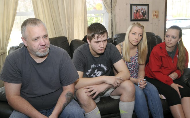 Kevin Alpaugh, left, and his children, Kevin Alpaugh II, Savannah Alpaugh, and JoHanna Alpaugh talk about their lives and Judy Alpaugh, Kevin's wife and the mother of his children, during an interview at their East Stroudsburg home on Wednesday, April 12, 2017. [Keith R. Stevenson/Pocono Record]
