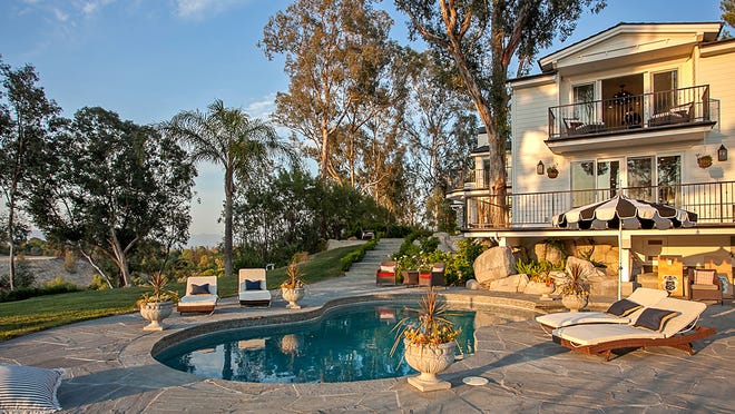 Ken Fuchs, director of such shows as "Shark Tank" and "The Bachelor," bought this traditional-style home in the Hidden Hills area of LA from Backstreet Boys member Nick Carter for $4.08 million. [Keller Williams Realty]