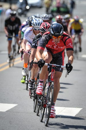 Men's Category 5 bike race in the Belmont Criterium held in 2013 in downtown Belmont. Special to the Gazette/Tom Ausburne