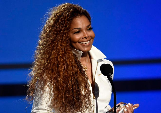 In this June 28, 2015 photo, Janet Jackson accepts the ultimate icon: music dance visual award at the BET Awards in Los Angeles. Amid reports of a split, Janet Jackson's husband Wissam Al Mana wrote a heartfelt letter to the superstar on his website. The pair recently became parents to a baby boy, Eissa Al Mana. A rep for Jackson did not confirm that they have split, but a message on his website professes his love for her, calling her the most beautiful person in the world. (Photo by Chris Pizzello/Invision/AP, File)
