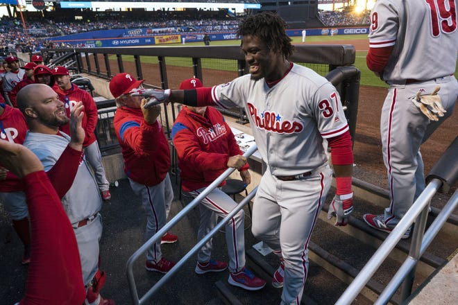 Odubel Herrera returns to the dugout after a first-inning solo home run during a game against the New York Mets on Tuesday, April 18, 2017, in New York.