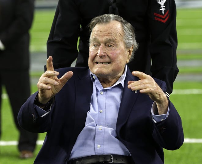 In this Feb. 5, 2017, file photo, former President George H.W. Bush arrives on the field for a coin toss before the NFL Super Bowl 51 football game between the Atlanta Falcons and the New England Patriots in Houston. Bush has been hospitalized in Houston since last Friday, April 14, 2017, with a recurrence of a case of pneumonia he had earlier in the year. Bush spokesman Jim McGrath said in a statement Tuesday, April 18, 2017, doctors determined he had a mild case of pneumonia which has been treated and resolved. THE ASSOCIATED PRESS