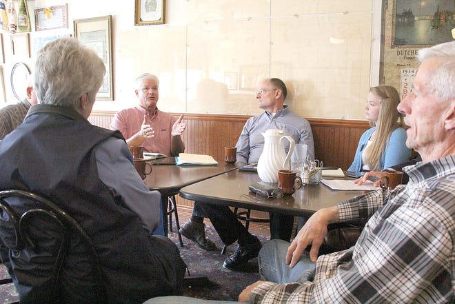 Senator Mike Shirkey (left) and Eric Leutheuser met with constituents Monday morning at DJ's Family Restaurant in Pittsford. 

[ANDY BARRAND PHOTO]